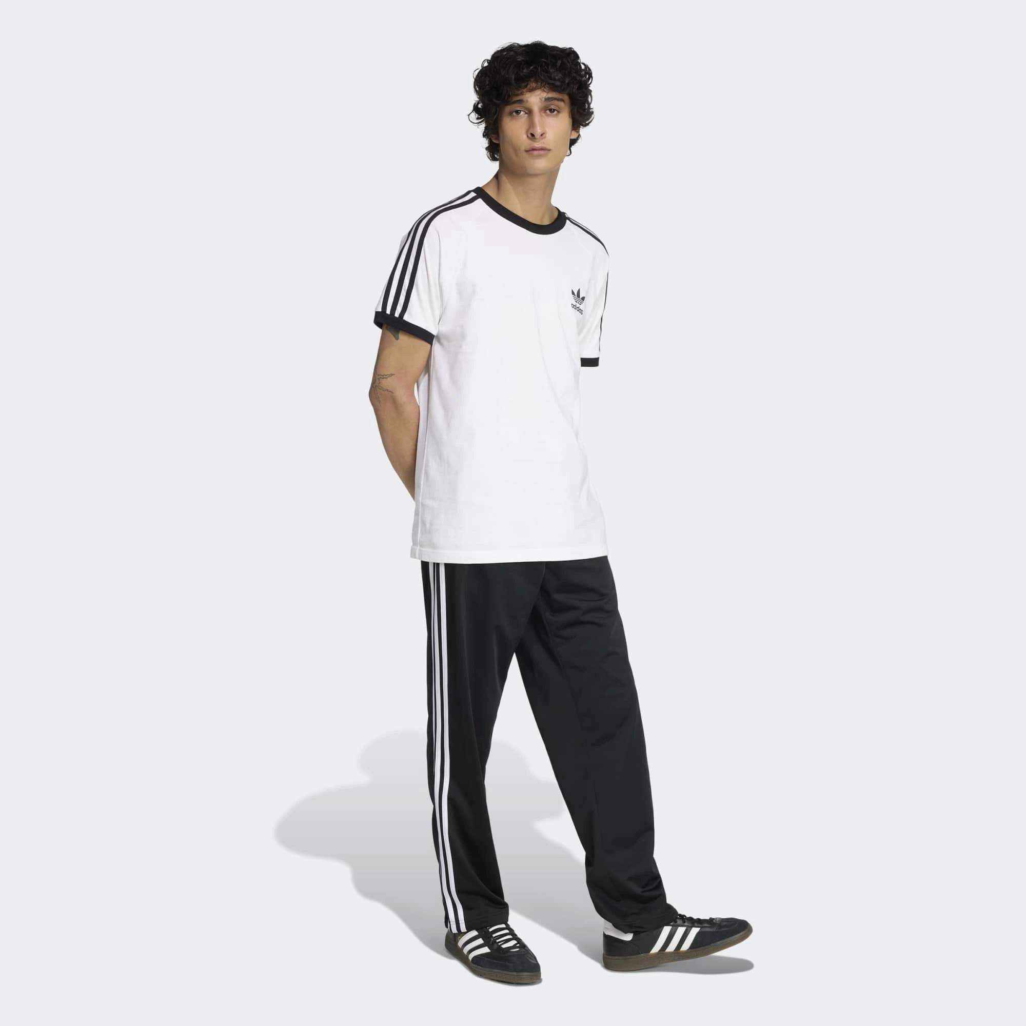 adidas Originals Firebird Track Pants KD8315 Black White - On Model Walking View | Stickabush Berlin
