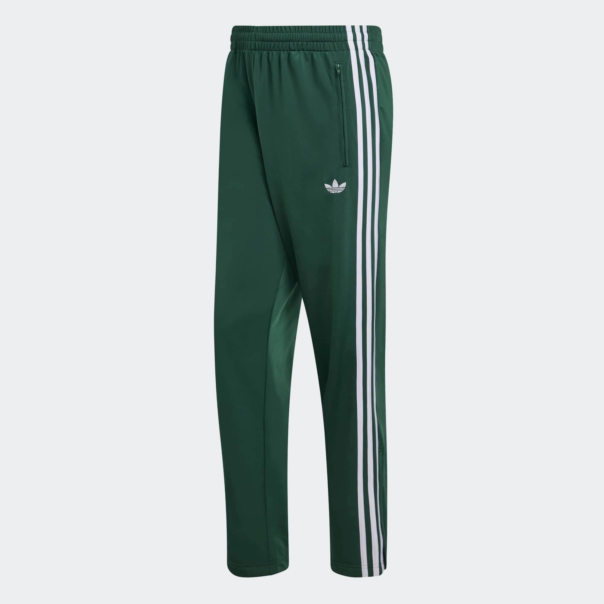 „Dunkelgrüne adidas Originals Firebird Damen Track Pants (KD8317) in Collegiate Green mit weißen Streifen – klassische Retro-Trainingshose erhältlich bei Stickabush Berlin.“