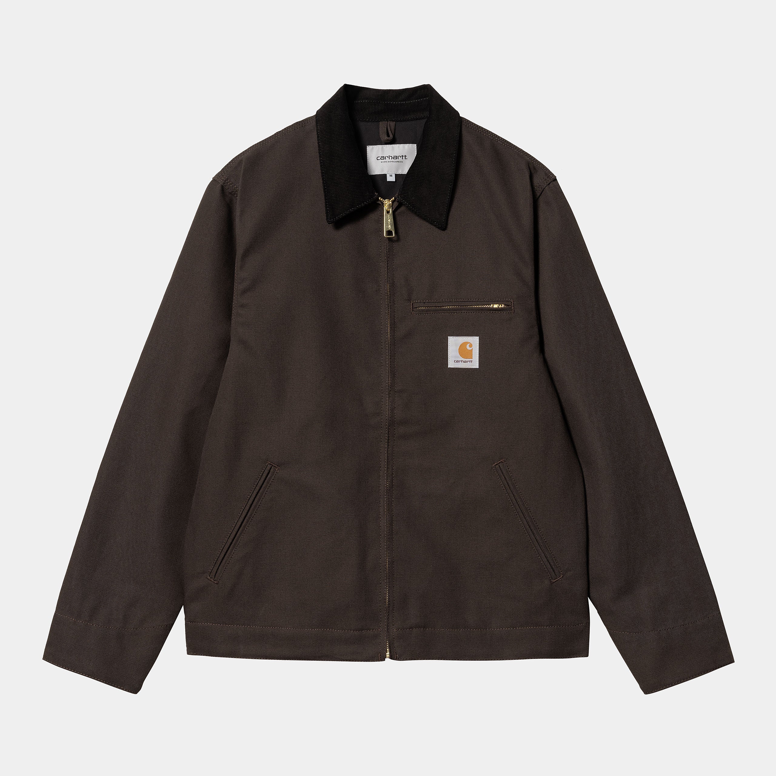 "Carhartt Detroit Jacket in Dunkelbraun, robustes Canvas, feste Jacke im klassischen Detroit-Stil mit Kragen und Reißverschluss.“
