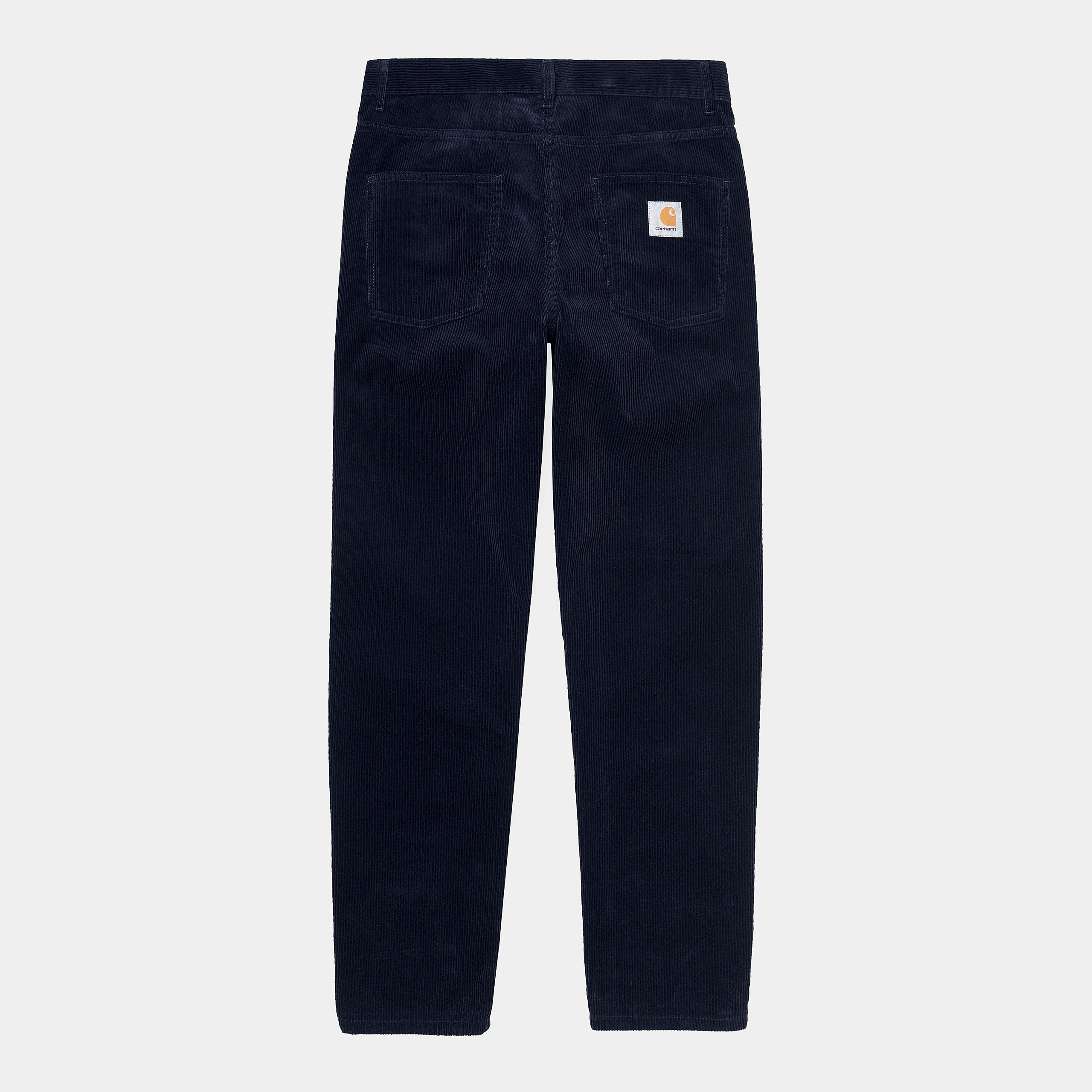 "Carhartt Newel Pant in Dunkelblau (Rinsed), Cordhose aus Baumwolle, lockere Passform, klassische Jeanshose in tiefem Marineblau."